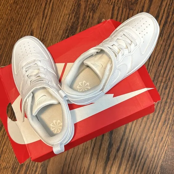 All white Nike shoes