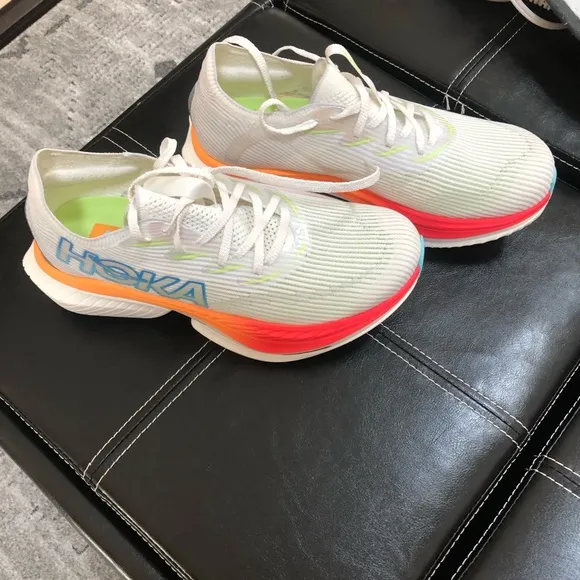 Hoka White and Red Athletic Shoes with Carbon Plate Design