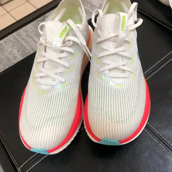 Hoka White and Red Athletic Shoes with Carbon Plate Design