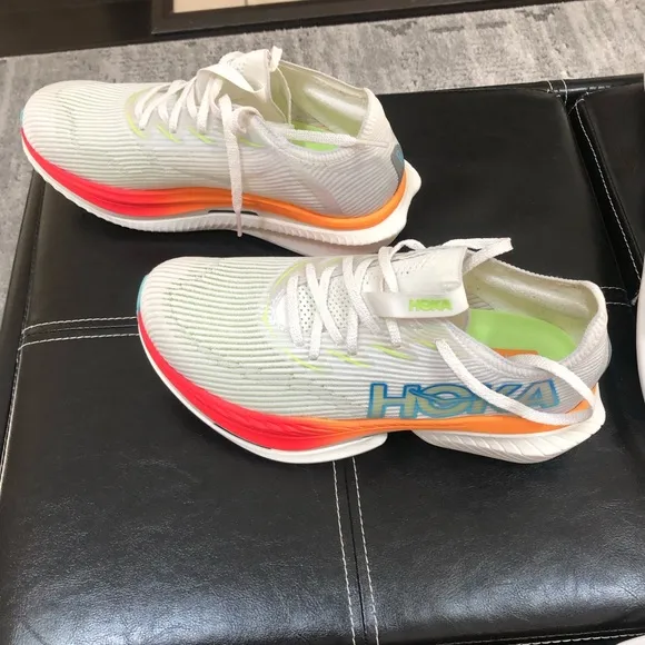 Hoka White and Red Athletic Shoes with Carbon Plate Design