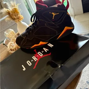 Jordan Black and Red Athletic Shoes with Iconic Design