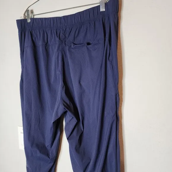 Lululemon Post Matter Pant. Navy blue.  Size XL. Zip Ankles.