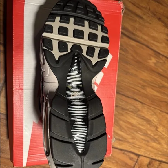Nike Black and Gray Athletic Shoes with Air Max Cushioning