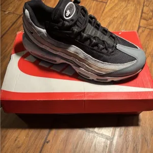 Nike Black and Gray Athletic Shoes with Air Max Cushioning