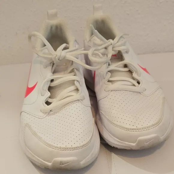 Nike White and Pink Athletic Shoes with Minimalist Design
