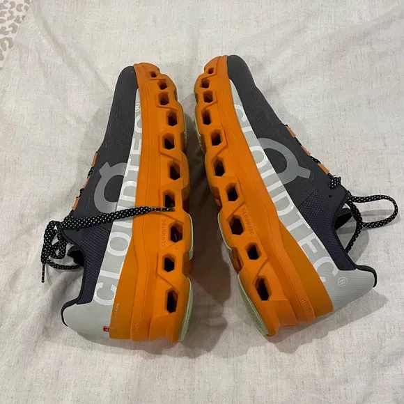 ON Men’s Cloudmonster Road Running Shoe 10.5 Eclipse Gray and Turmeric Orange