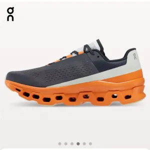 ON Men’s Cloudmonster Road Running Shoe 10.5 Eclipse Gray and Turmeric Orange