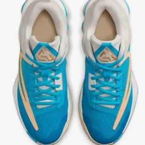X SALE X Nike Blue Athletic Shoes with Cream Accents